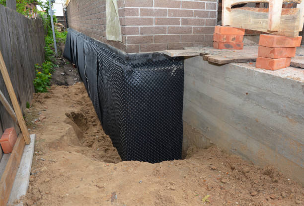 SJ Waterproofing Pros technician performing targeted Vapor Barrier Installation assessment in Gresham, OR